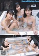 A group of young women in a bathtub in a bathroom.